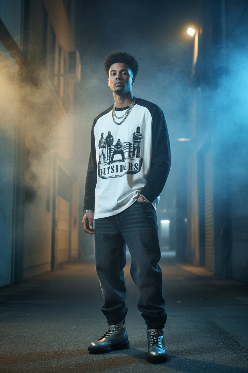 Black and white long-sleeve shirt with 'Outsiders' graphic design on a white background