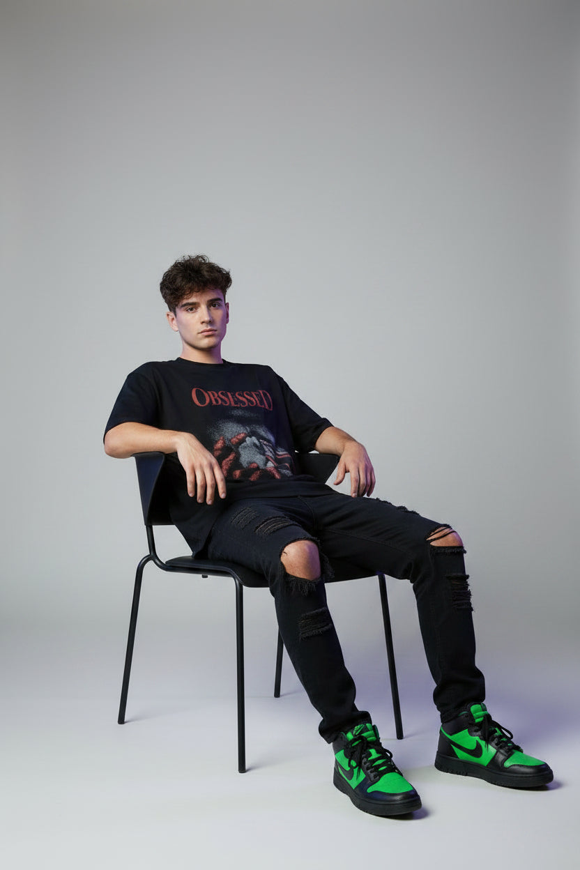 Black t-shirt with graphic design and 'OBSESSED' text on a white background