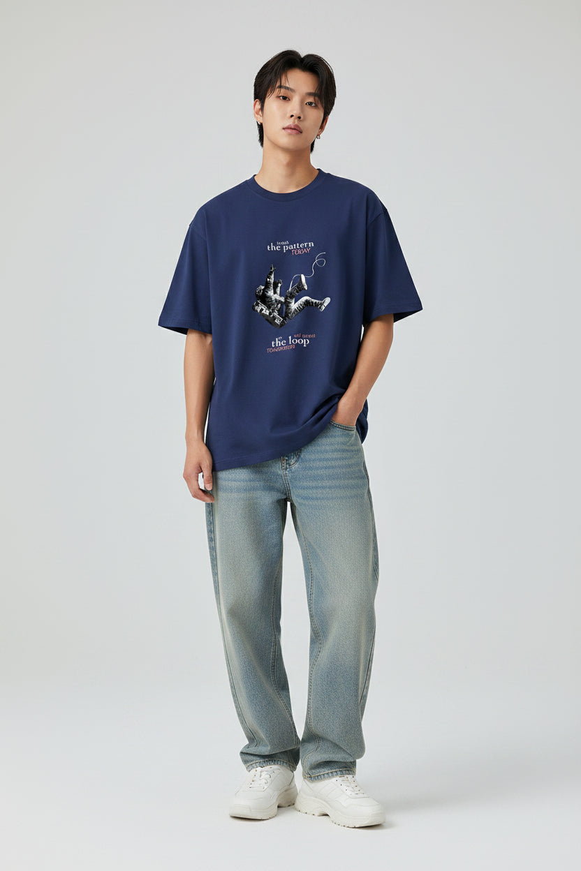 Navy blue t-shirt with graphic design and text on a white background