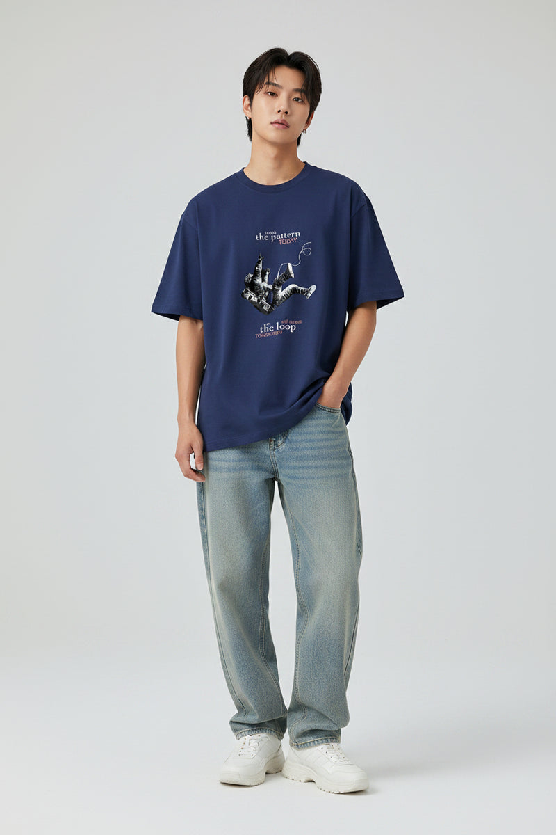 Navy blue t-shirt with graphic design and text on a white background